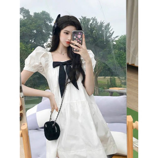 Đầm babydoll trắng kèm nơ đen