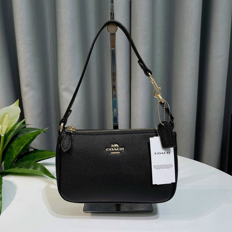 Túi kẹp nách Coach Nolita dáng thuyền