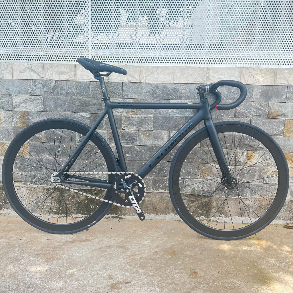 Xe đạp fixed gear TSUNAMI SNM100 nâng cao - Đen nhám chữ đen