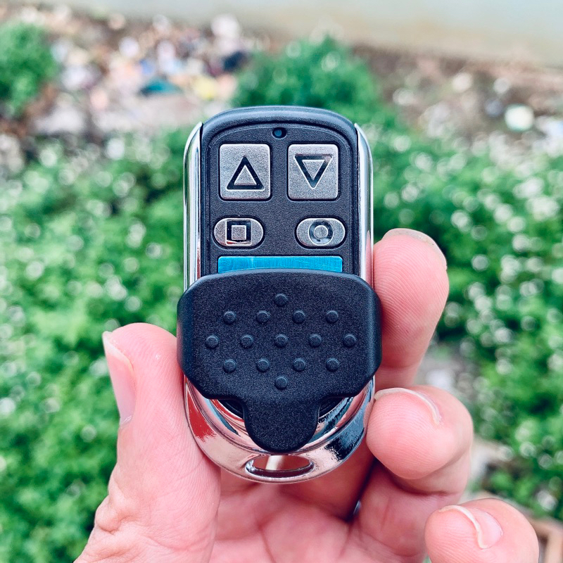 Tay bấm cửa cuốn, remote cửa cuốn, chìa khoá cửa cuốn 433/315/336/365 mã gạt mã nhảy giá tốt