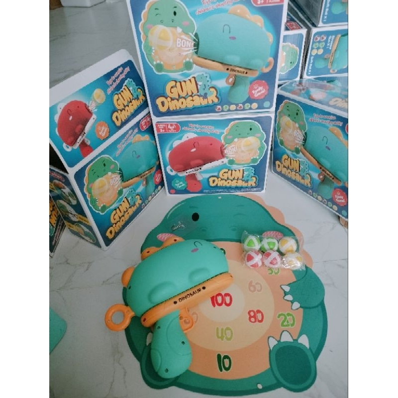 Đồ Chơi Bắn Bóng Khủng Long Vui Nhộn Cho Bé Có 3 Màu Xanh Vàng Đỏ Kèm 6 Bóng Và Móc Treo Cho Bé