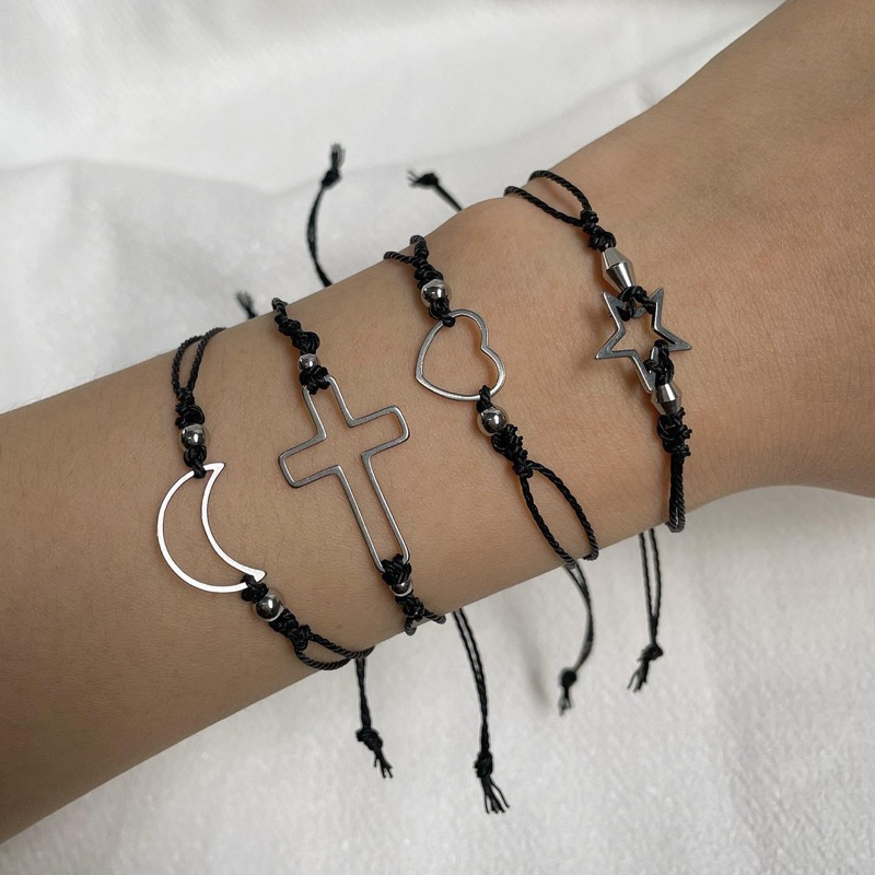 Vòng tay dây rút với charm thép titan không đen không gỉ Madde