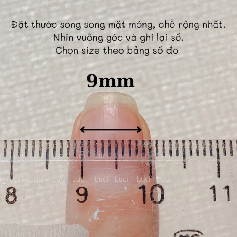 Móng giả thiết kế màu xanh L015 gắn charm hologram luci.nailbox