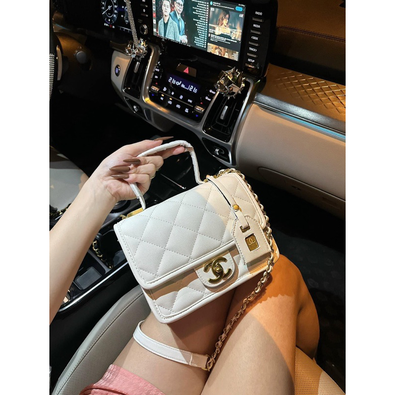 Túi C.N tag đồng quai xách