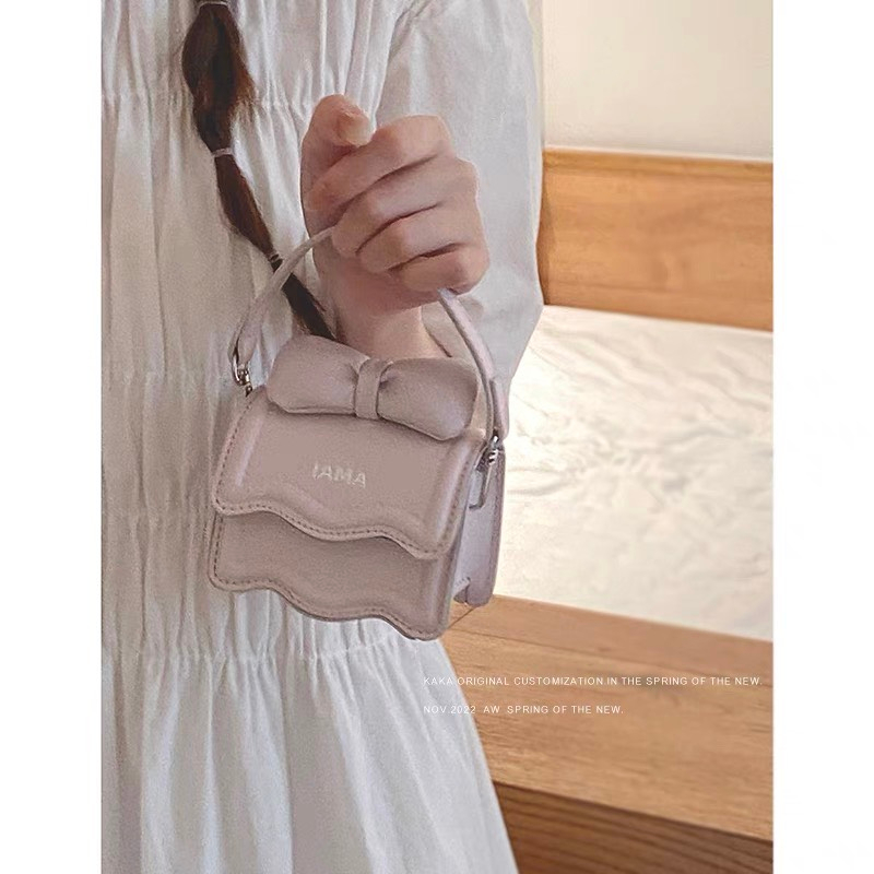 Túi Nơ Amai Mini Cầm Tay, Đeo Chéo Nữ Phong Cách Hàn Phối Đồ Siêu Xinh
