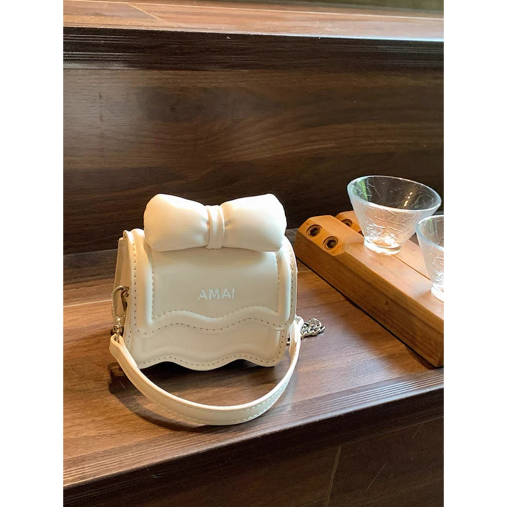 Túi Nơ Amai Mini Cầm Tay, Đeo Chéo Nữ Phong Cách Hàn Phối Đồ Siêu Xinh