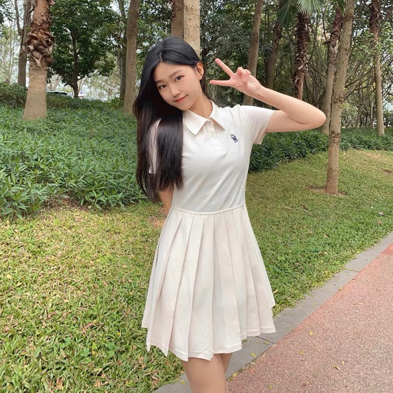 Váy polo xếp li thêu gấu