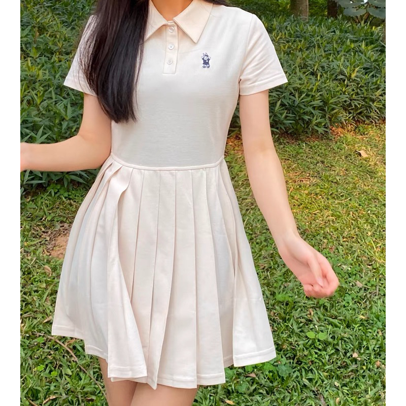 Váy polo xếp li thêu gấu