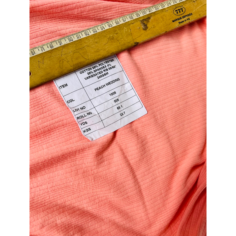 Vải thun gân màu xanh và cam loại vừa vặn