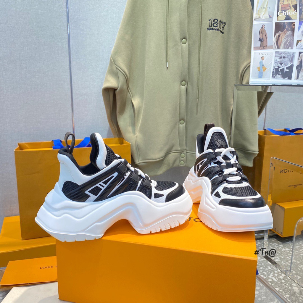 GIÀY THỂ THAO LV ĐEN TRẮNG NÂNG ĐẾ