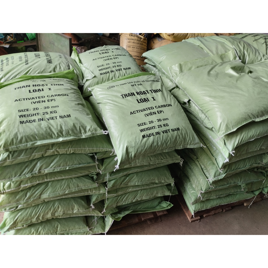 Than hoạt tính viên ép loại 1 bao 25kg .