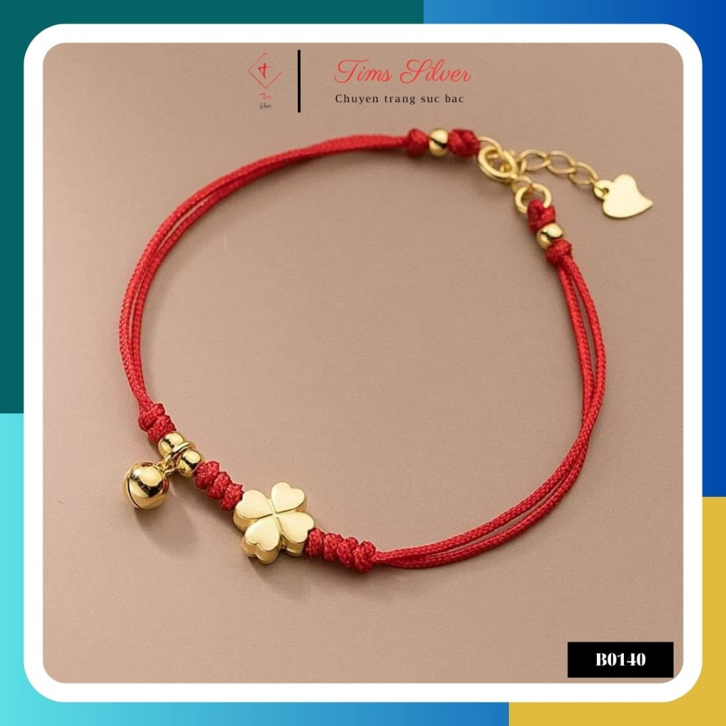 Vòng tay/Lắc tay dây tết chỉ đỏ mix hình cỏ bốn lá may mắn và chuông nhỏ bạc xi vàng dành cho nữ TIMS B0140