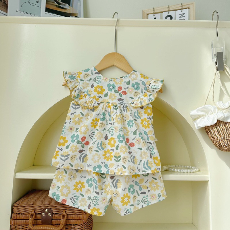 Bộ bé gái cổ tròn tay cánh tiên hoa nhí vải thô lụa cao cấp