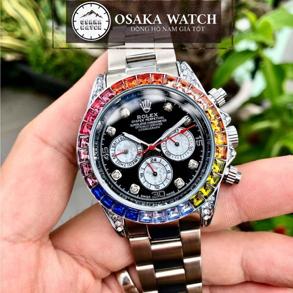 Đồng Hồ Cơ Nam Rolex Rainbow Daytona R065DB Viền Đá 7 Màu Dây Kim Loại Đúc Hoạt Động Full Kim Cao Cấp