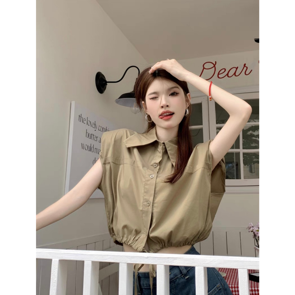 Áo kiểu vải XONXEN SHOP QUY NHƠN QC nt cổ nhọn rút dây, có độn vai ,form vừa cực dễ phối lại siêu cá tính mã 888846