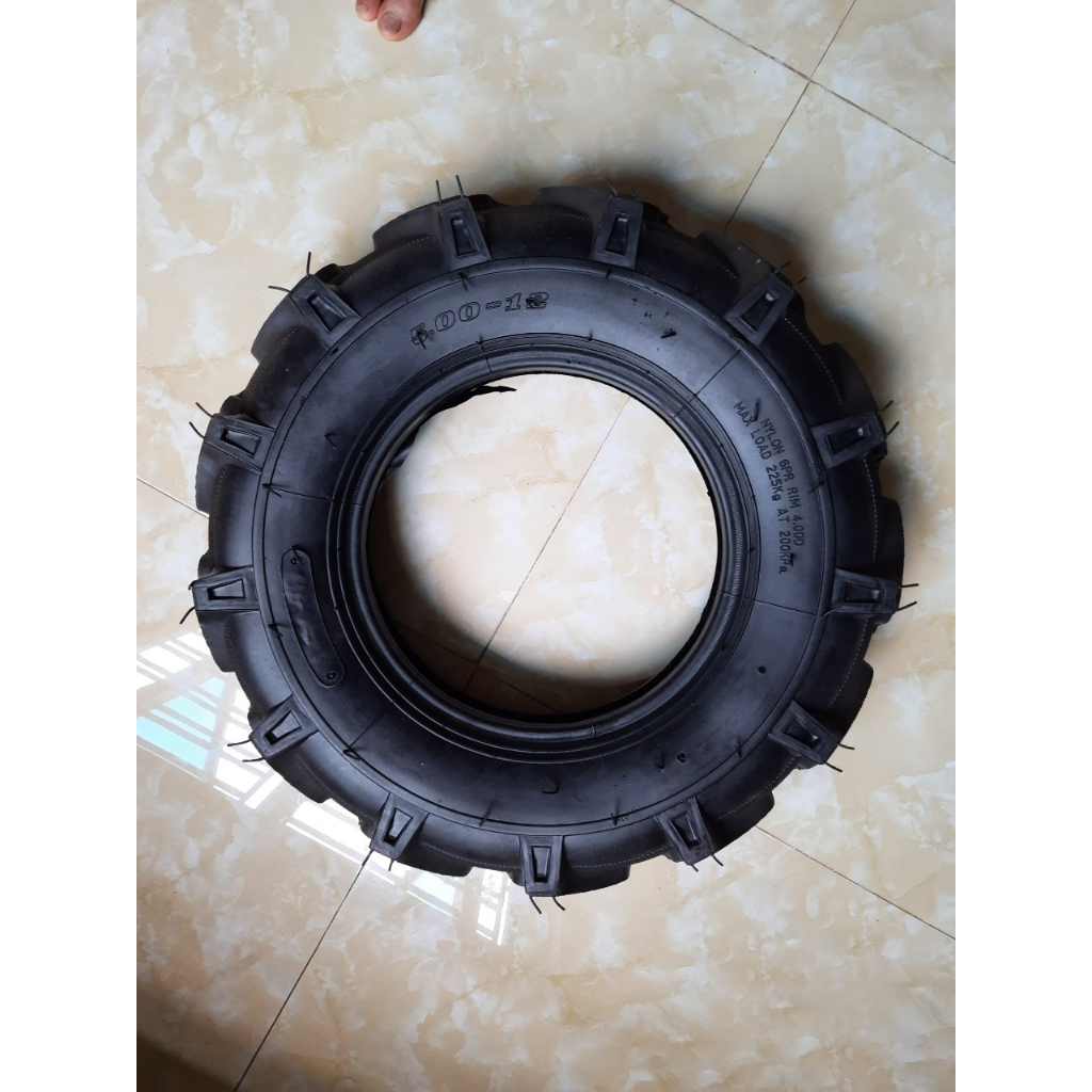 1 Vỏ,lốp gai v 500-12, dùng ráp cho các loại mâm,lazang 400,450,500-12, đường kính 56cm,bề rộng 12cm