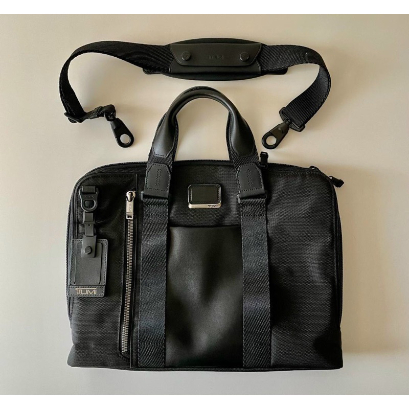 Cặp Tumi da thật phối vải