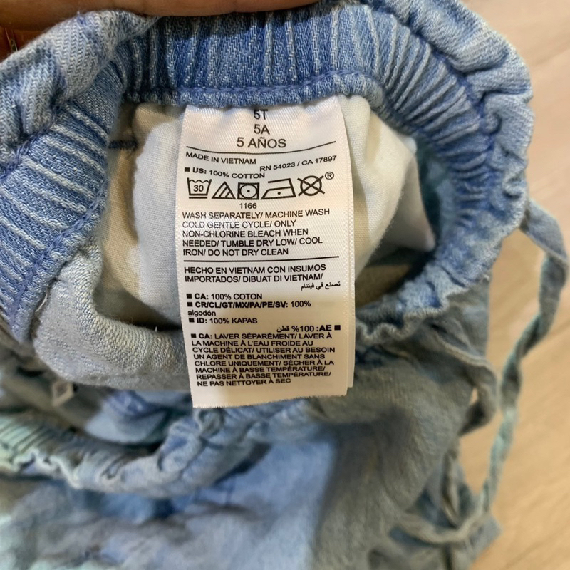 Quần short bò giấy bé gái, hàng dư