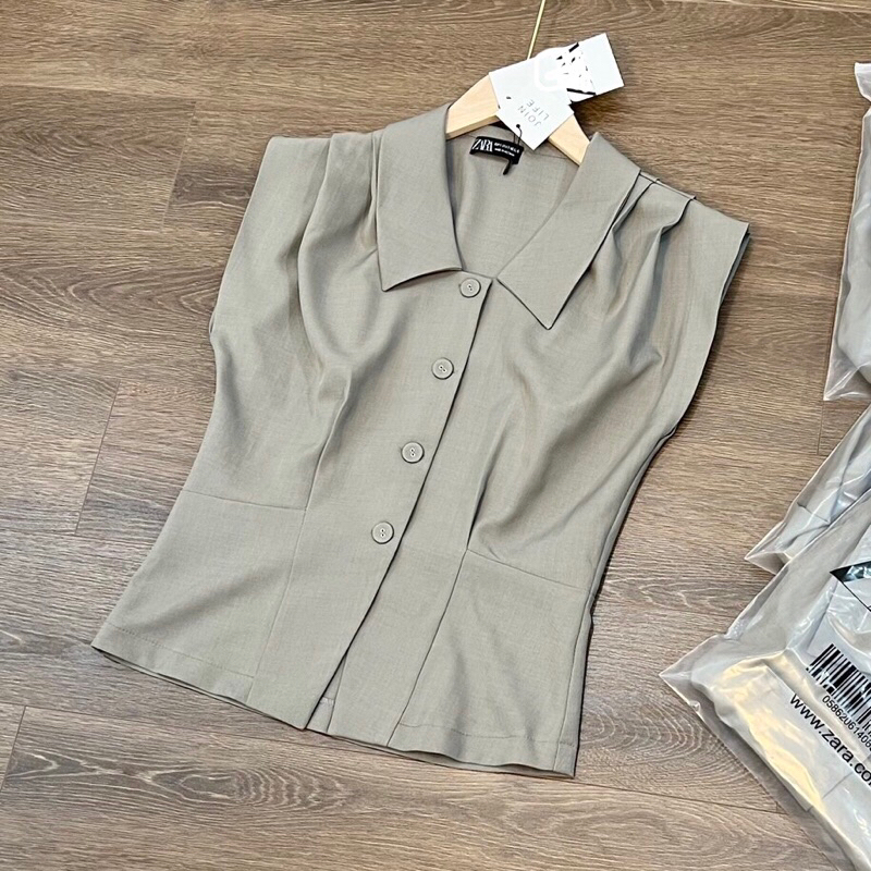 Áo sơmi xếp li vai