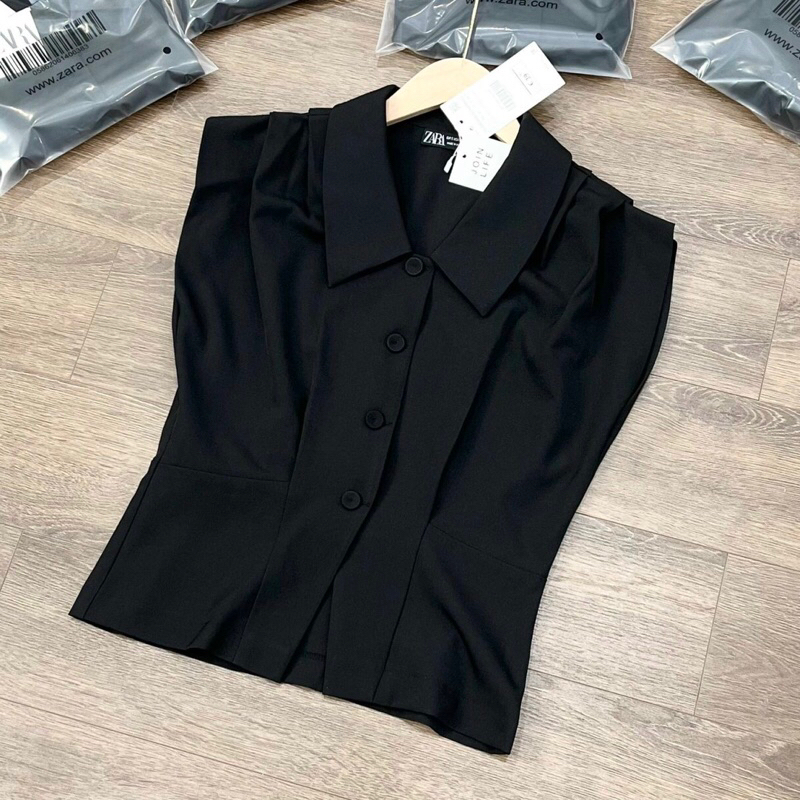 Áo sơmi xếp li vai