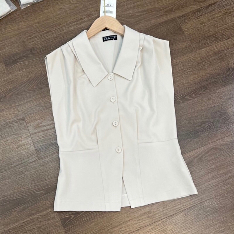 Áo sơmi xếp li vai