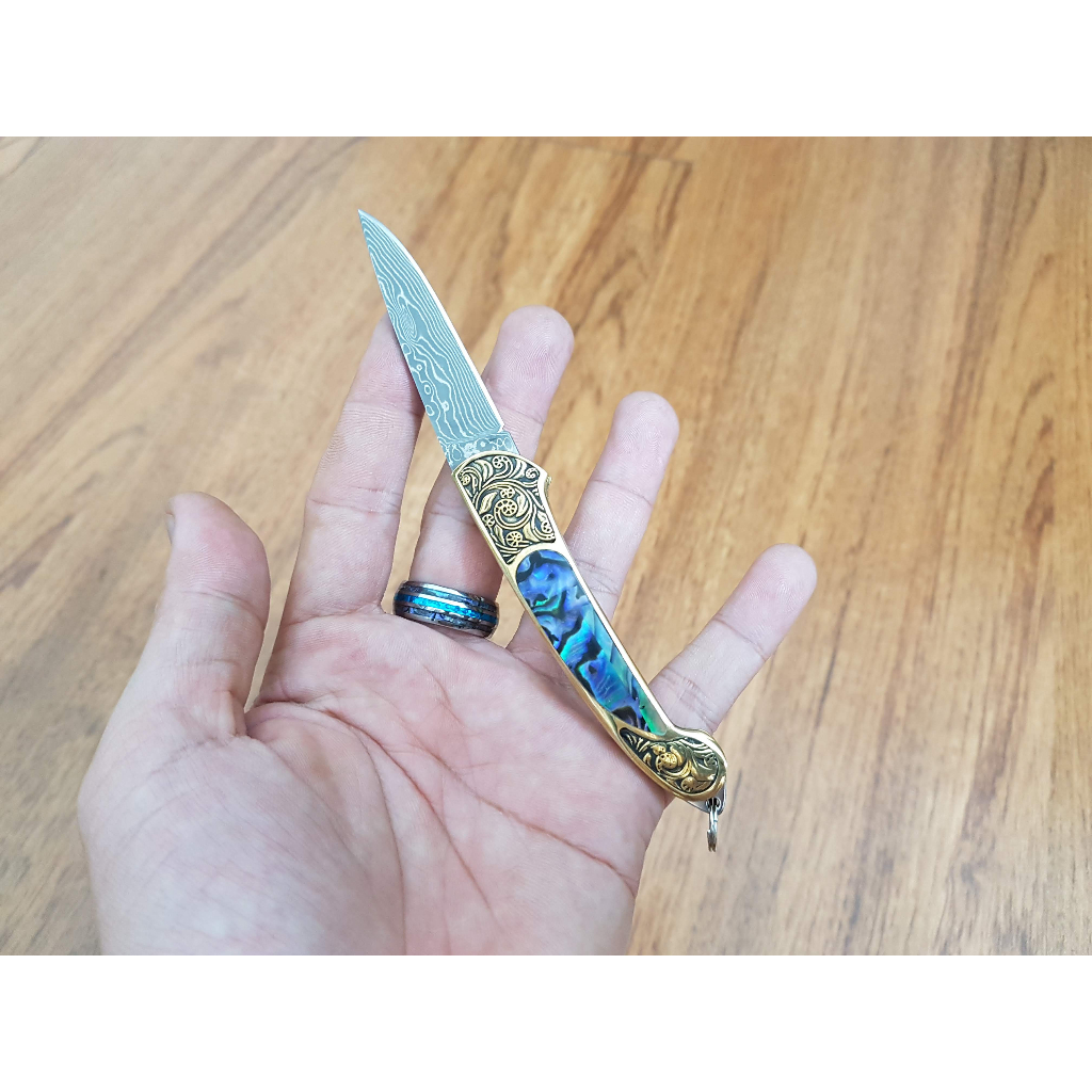 Dao vân damascus cán đồng