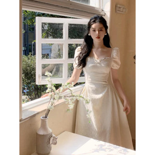 Đầm dự tiệc màu kem tay bồng khoét eo xinh xắn - Charlet dress