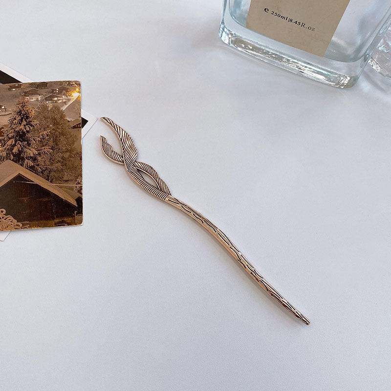 Trâm kim loại lông vũ búi tóc sang trọng đơn giản Tatitava