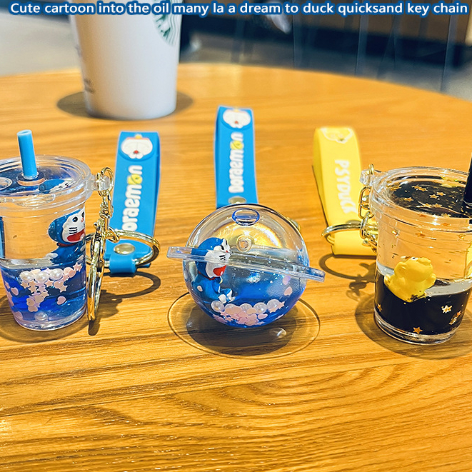 Móc khoá mèo doraemon pha lê cute dễ thương treo chìa khoá,móc khoá chuyển động độc đáo vịt pokemon Bolita