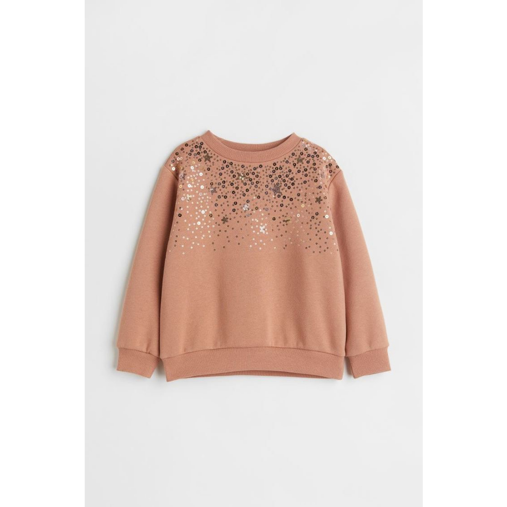 Áo nỉ tay dài màu kem đính kim sa dành cho bé gái