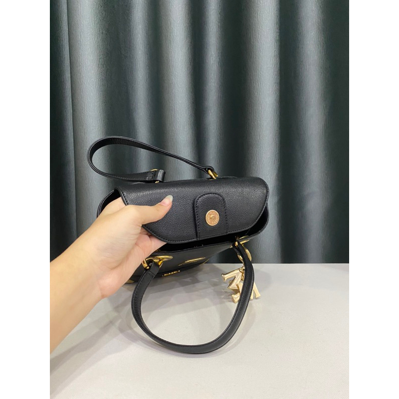 Túi si hiệu M.C.M của Đức dáng cái xô xách ta.y da thật