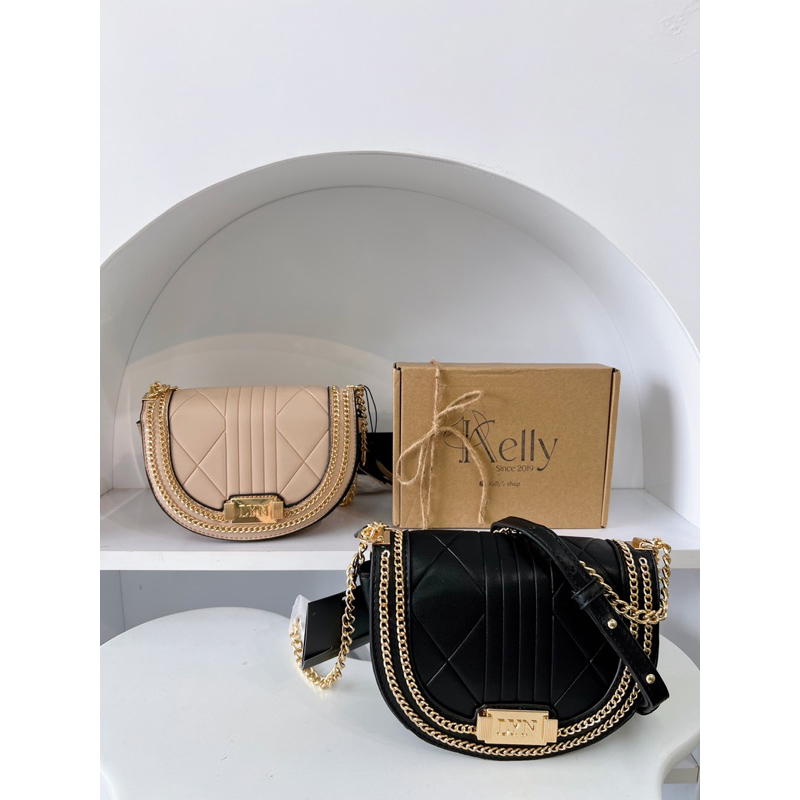 Túi L Y N phom bầu