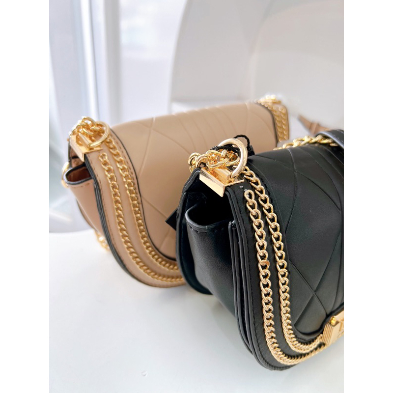 Túi L Y N phom bầu