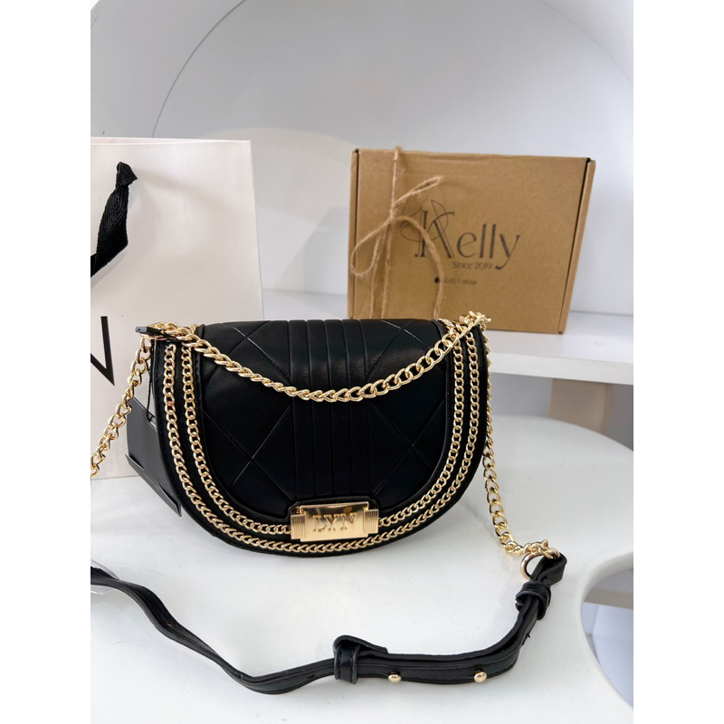 Túi L Y N phom bầu