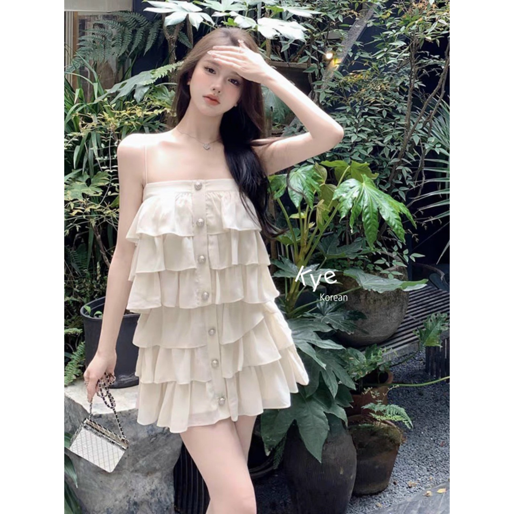 Sét áo hai dây tầng cúc ngọc, áo hai dây hở lưng nữ mix chân váy trơn cạp chun.