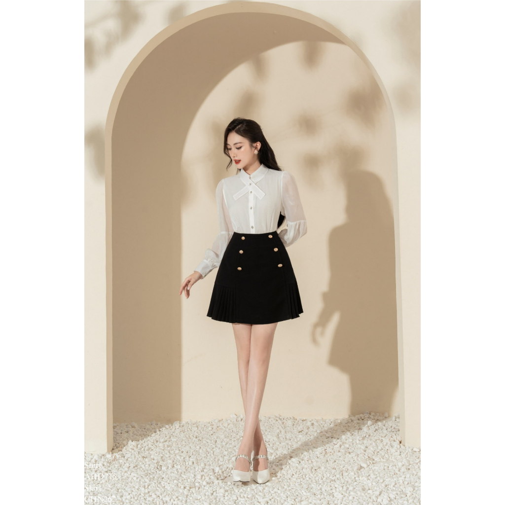 Chân váy đính khuy gấu xoè dập ly 2 bên chất tuyết mưa - CHN262