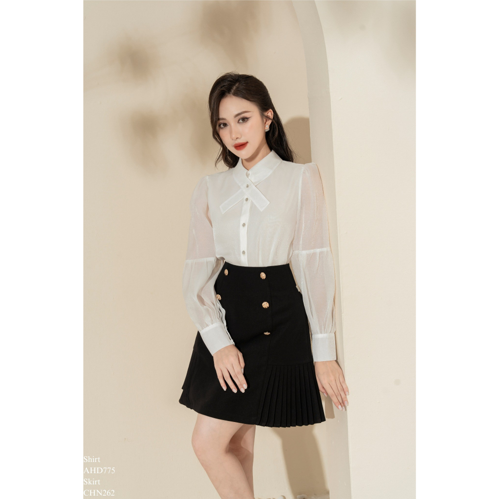 Chân váy đính khuy gấu xoè dập ly 2 bên chất tuyết mưa - CHN262