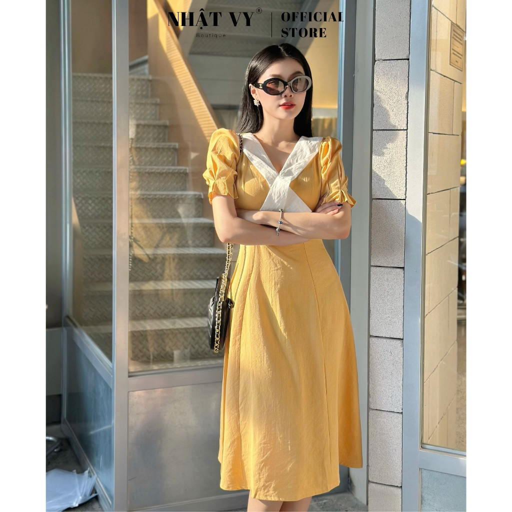 Đầm công sở Nhật Vy dáng xoè cổ phối chéo cách điệu tay nhún kiểu chất linen thun phù hợp đi chơi dạo phố - D2799