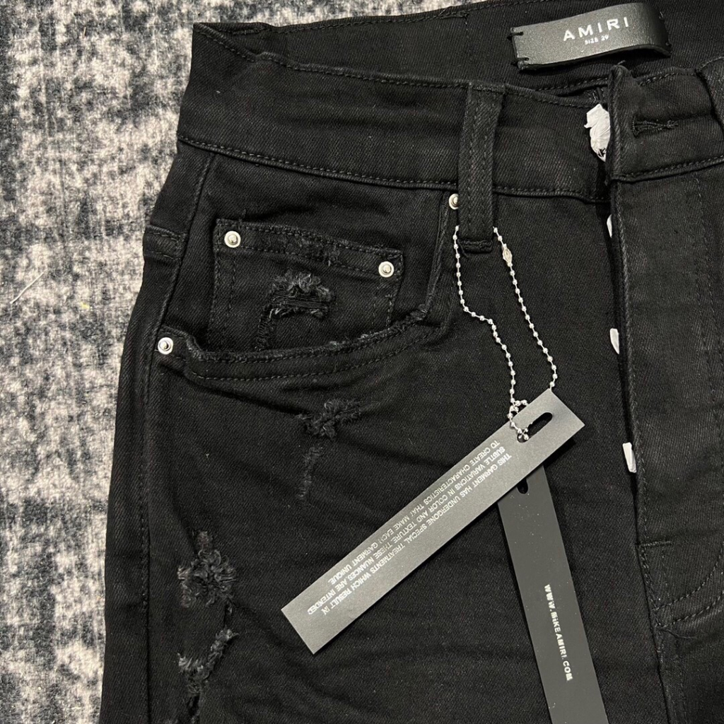 Quần Jean Nam AMIRI Đen Vá Da Trắng Quần Jean nam màu đen gối lót da trắng nhăn