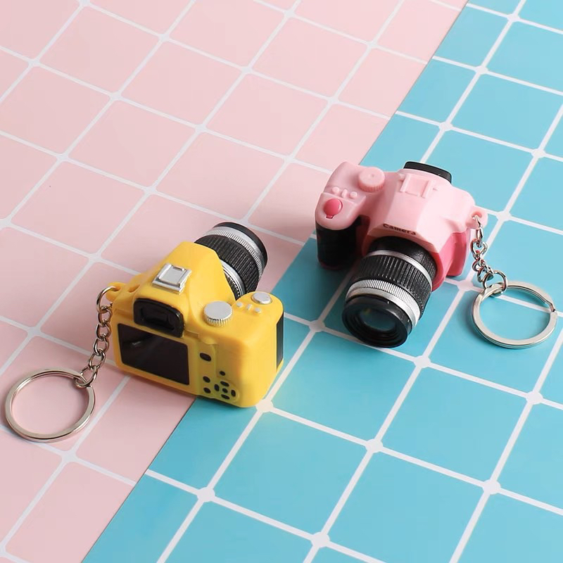 Móc khóa máy ảnh dễ thương có đèn và âm thanh