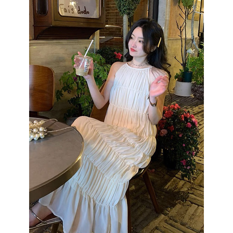 Đầm midi yếm hở lưng thắt nơ