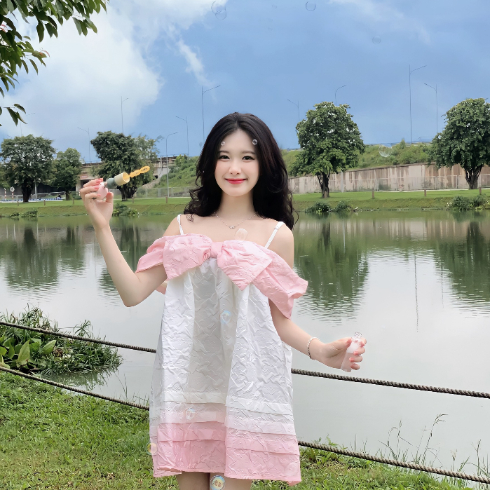 Đầm Babydoll Xòe Nơ Ngực Rớt Vai Loang Hồng