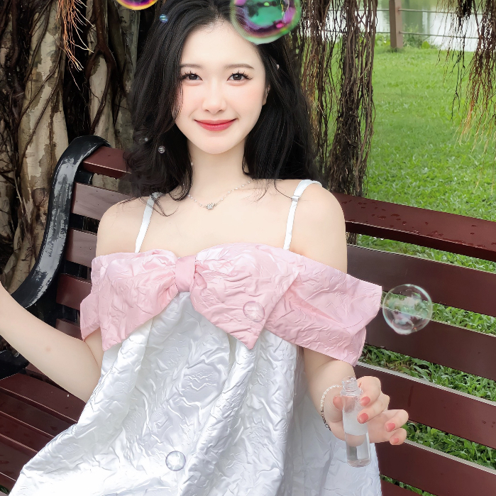 Đầm Babydoll Xòe Nơ Ngực Rớt Vai Loang Hồng