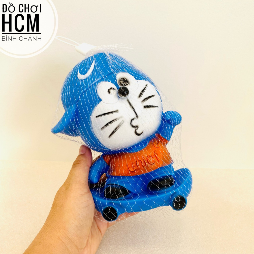 Đồ chơi thú bóp kêu chíp chíp hình Doremon, Vịt vàng cho bé cầm tay, bóp mềm giảm căng thẳng, xả stress