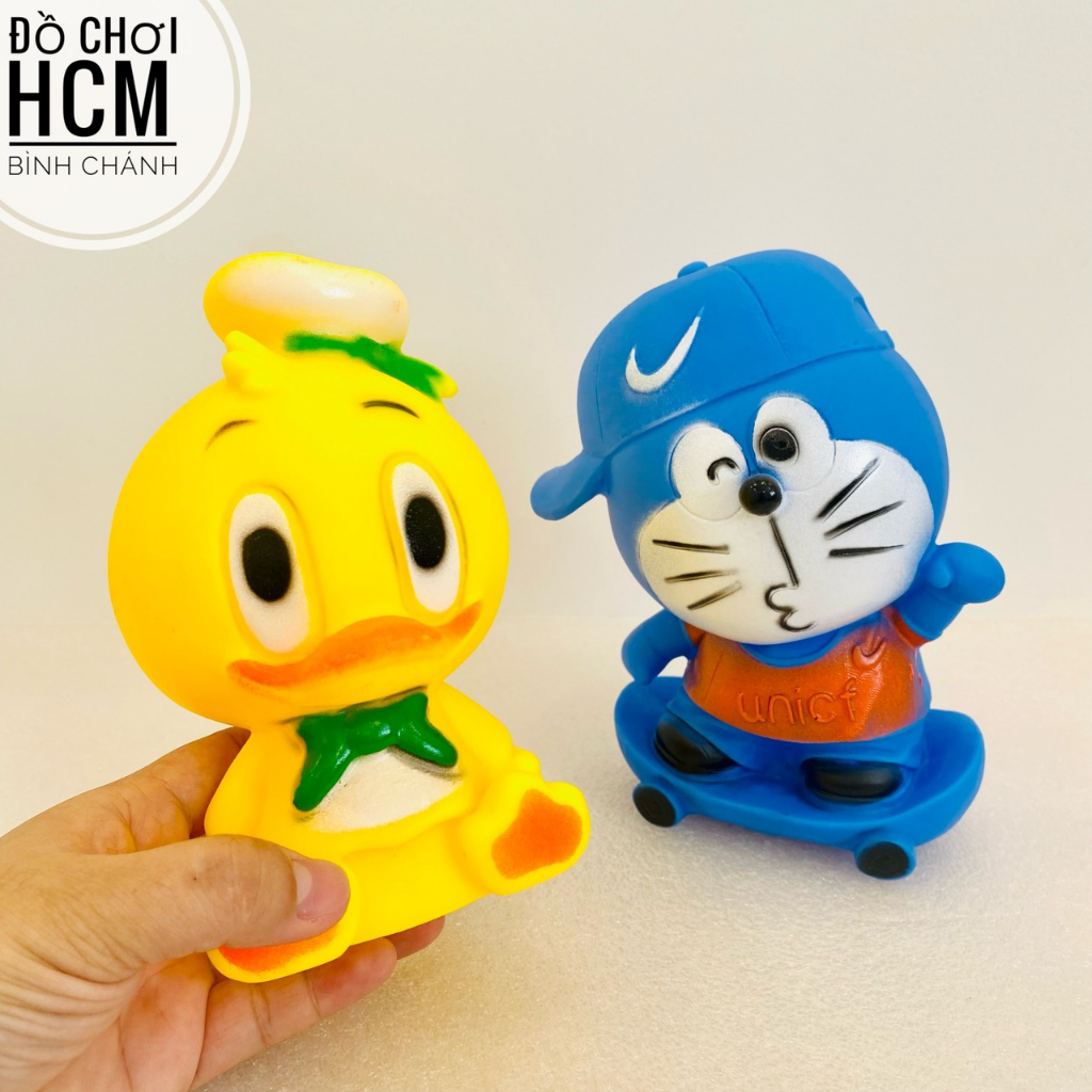 Đồ chơi thú bóp kêu chíp chíp hình Doremon, Vịt vàng cho bé cầm tay, bóp mềm giảm căng thẳng, xả stress