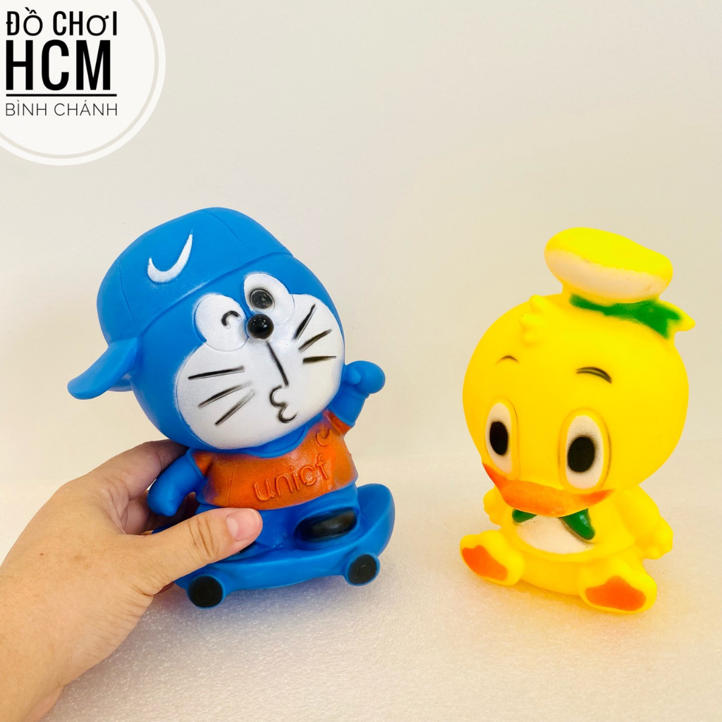 Đồ chơi thú bóp kêu chíp chíp hình Doremon, Vịt vàng cho bé cầm tay, bóp mềm giảm căng thẳng, xả stress