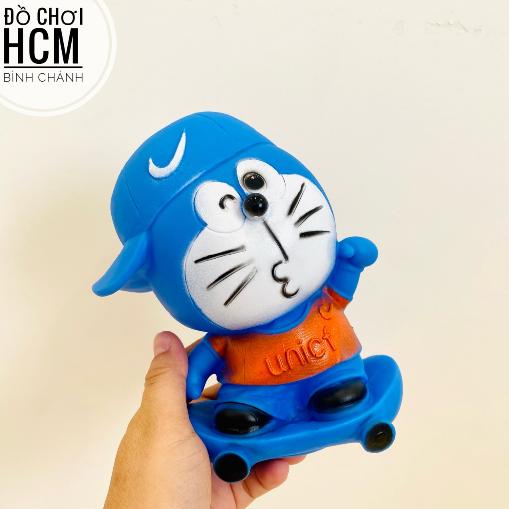 Đồ chơi thú bóp kêu chíp chíp hình Doremon, Vịt vàng cho bé cầm tay, bóp mềm giảm căng thẳng, xả stress