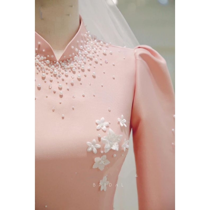 Áo dài hồng hỏi cưới tay phồng đính hoa