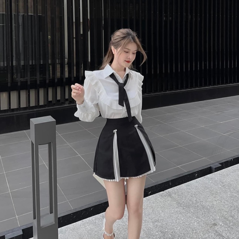 Mã Mới Hot Sét Áo Sơ Mi Nơ Bèo Kèm Chân Váy Trắng Xếp Ly Phối Tà Đen Sang Chảnh