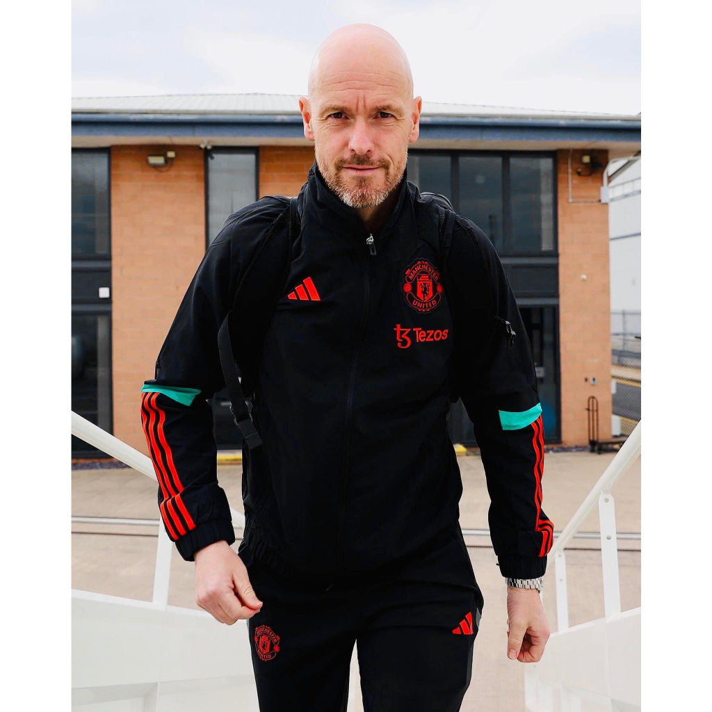 Áo khoác training MU- đen khuỷ tay xanh lá